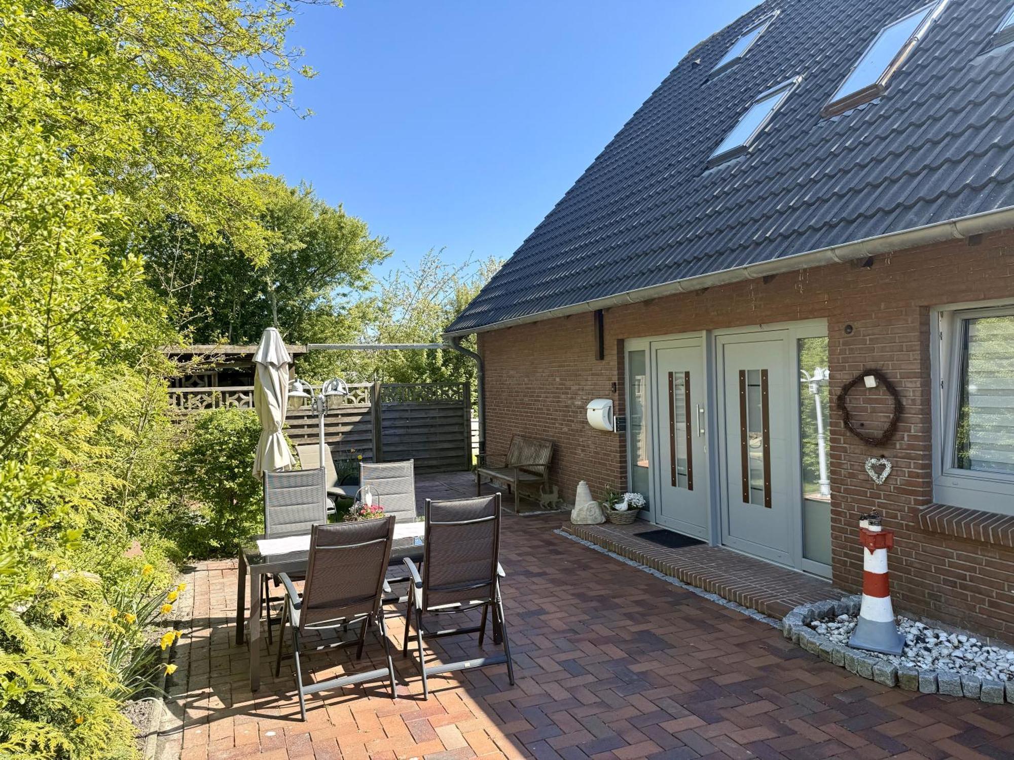 Ferienhaus Blinkfuer Neuharlingersiel Exterior photo